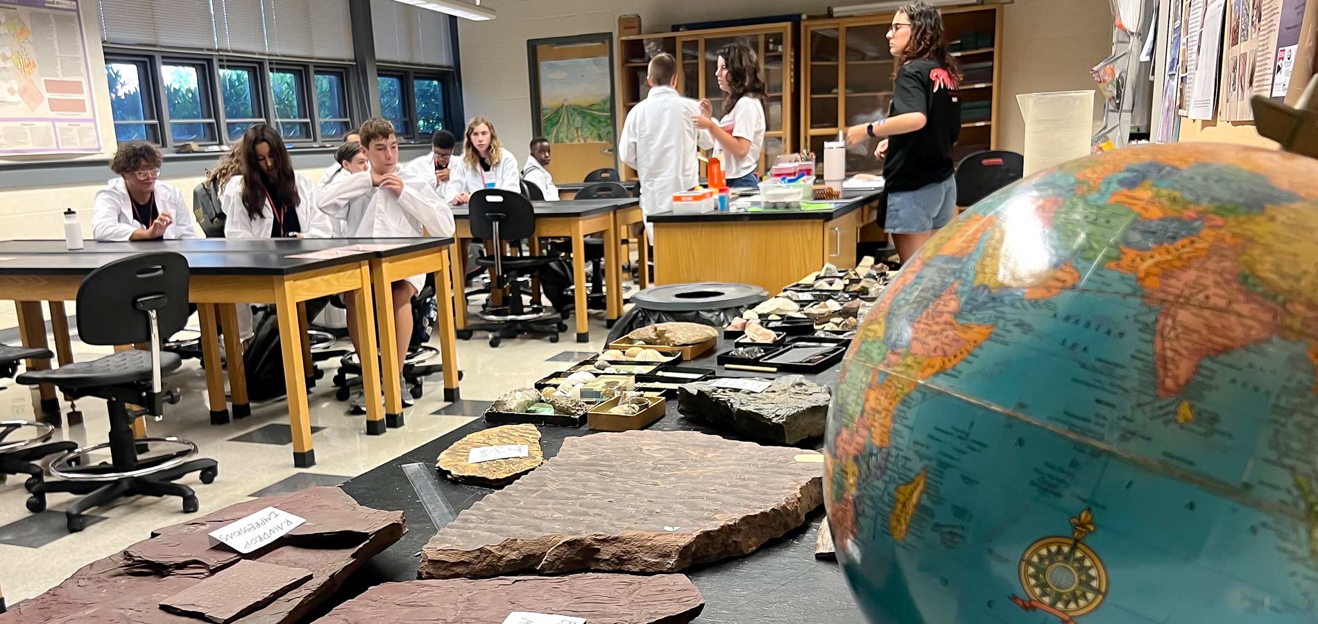 The students break into collaborative teams and begin their studies.